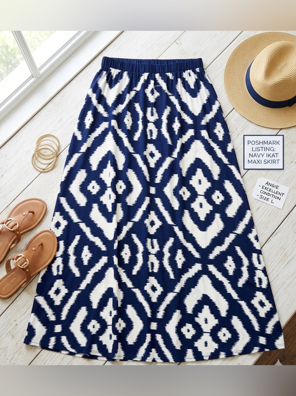 Angie bohemian-inspired navy S maxi skirt with bold ikat and geometric prints.